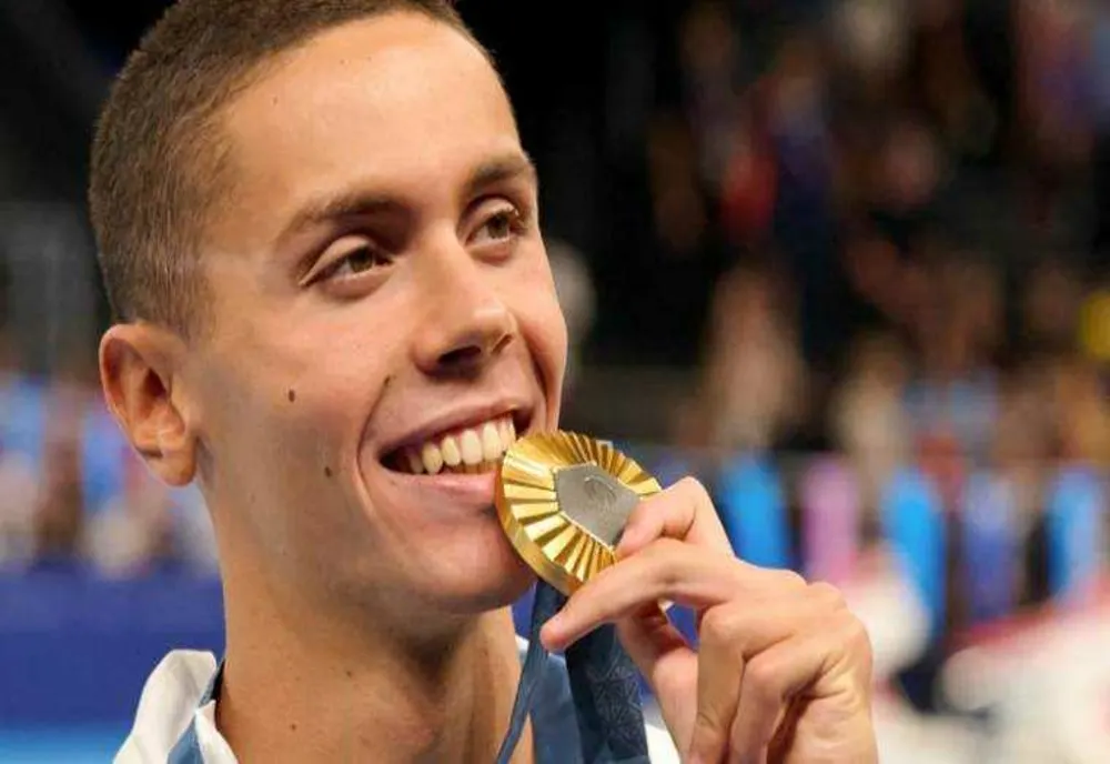 DAVID POPOVICI CUCEREȘTE AURUL OLIMPIC LA 200 M LIBER