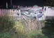 FOTO. Un şofer s-a răsturnat cu autoturismul peste un gard, în Argeş