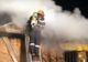 Incendiu provocat de o lumânare. O femeie a fost salvată de pompieri